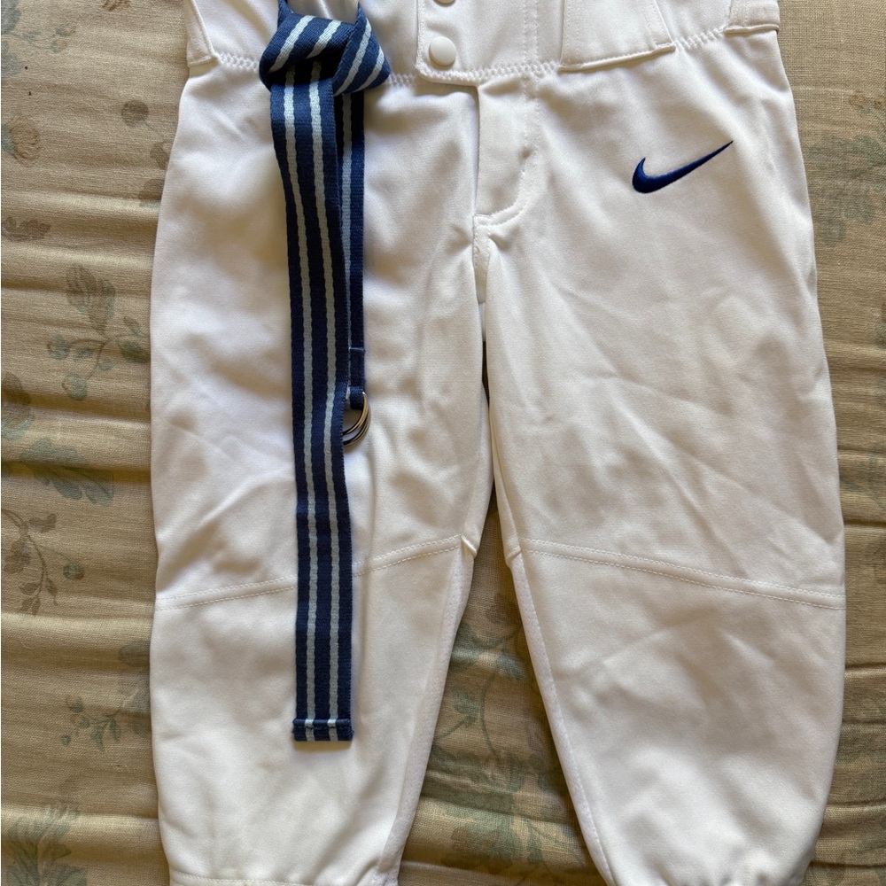 Nike White Kids Baseball Pants with Blue Swoosh